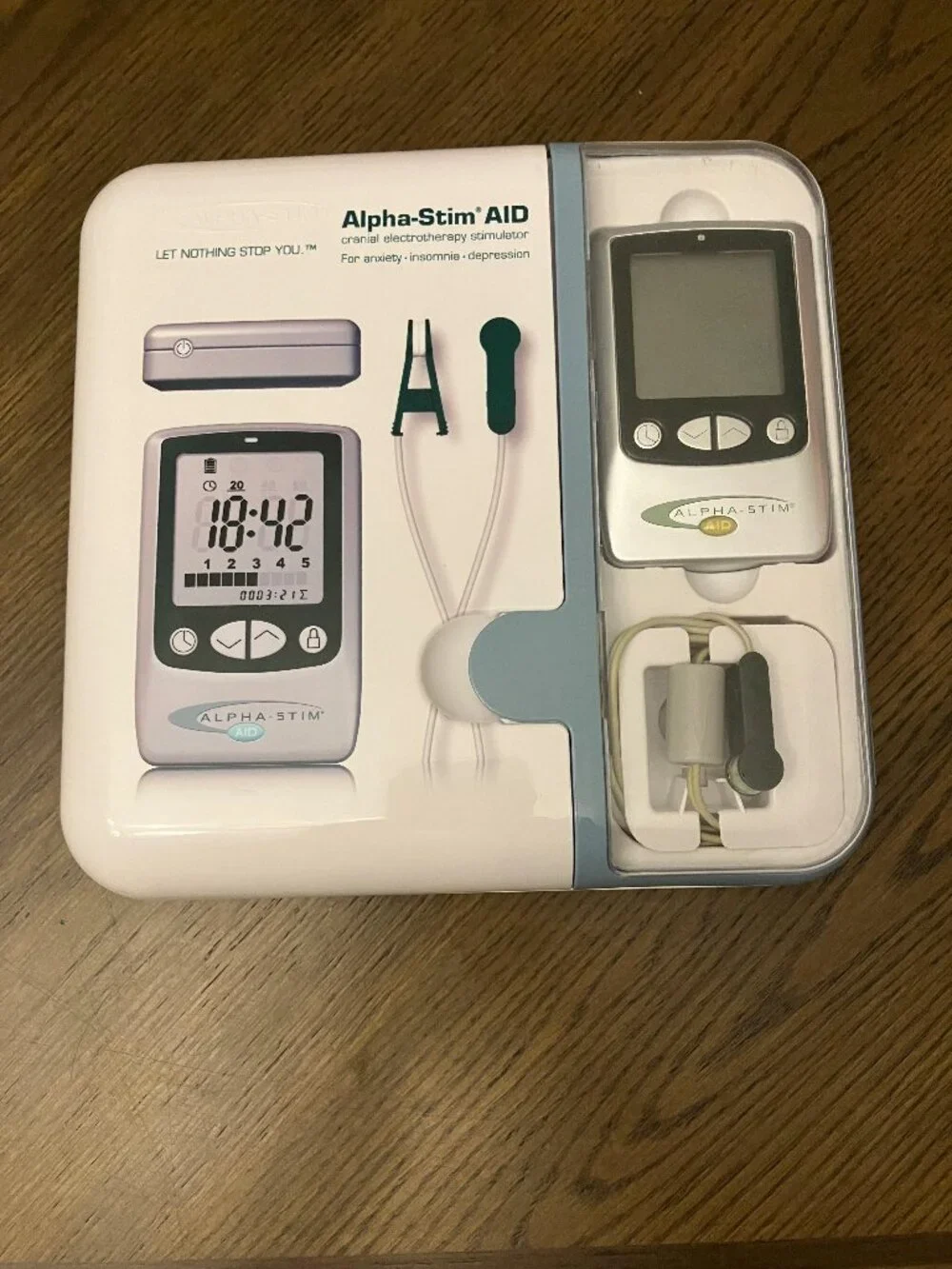 Alpha-Stim AID device kit